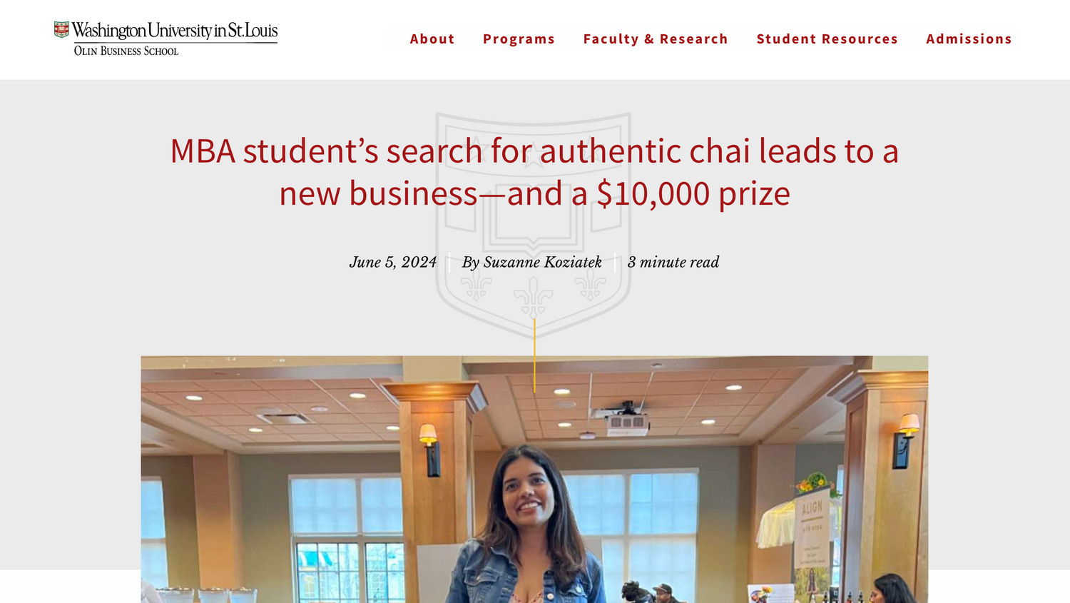 Screenshot of a webpage from Washington University in St. Louis (WashU)'s news page titled "MBS student's search for authentic chai leads to a new business—and a $10,000 prize." Below is a photo of a woman smiling.